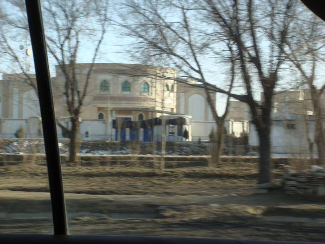 kabul university logo. side of Kabul University.